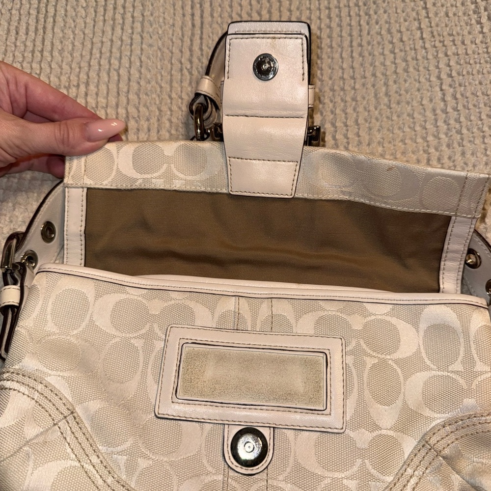 Elegant Cream Coach Designer Handbag